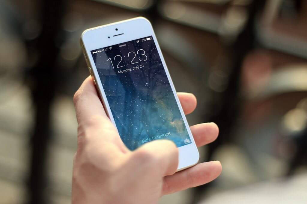 A person using an iphone.